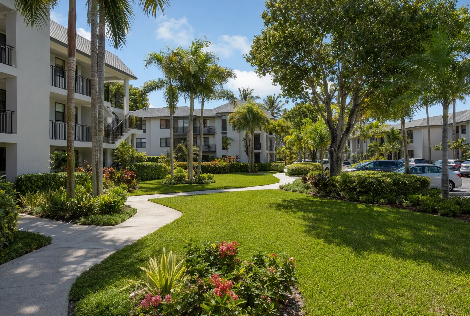 Boca Raton Apartments Near Beaches: Best Quiet Options 1 Quiet courtyard with palm trees and low-rise apartments
