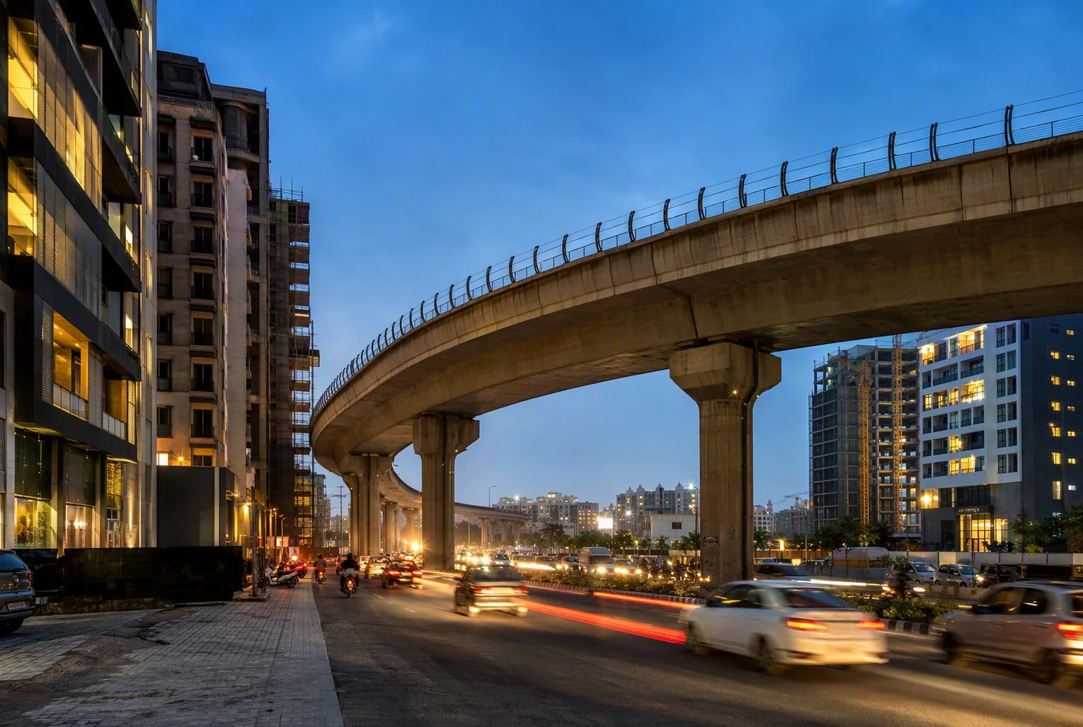 Evening traffic beneath Sohna elevated corridor