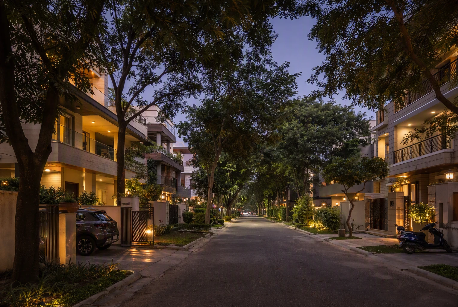 Tree-lined lane with low-rise builder floors